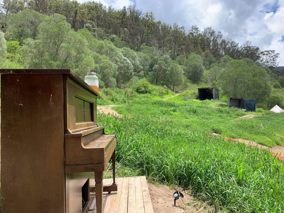 Haunted Piano, looking to Pineapple Shed and Metal Cabins